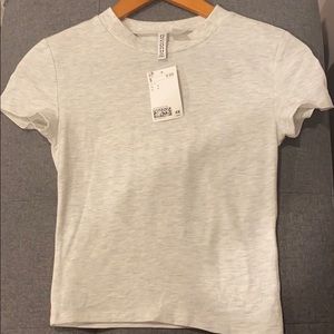 Short fitted shirt, cotton with rounded neckline